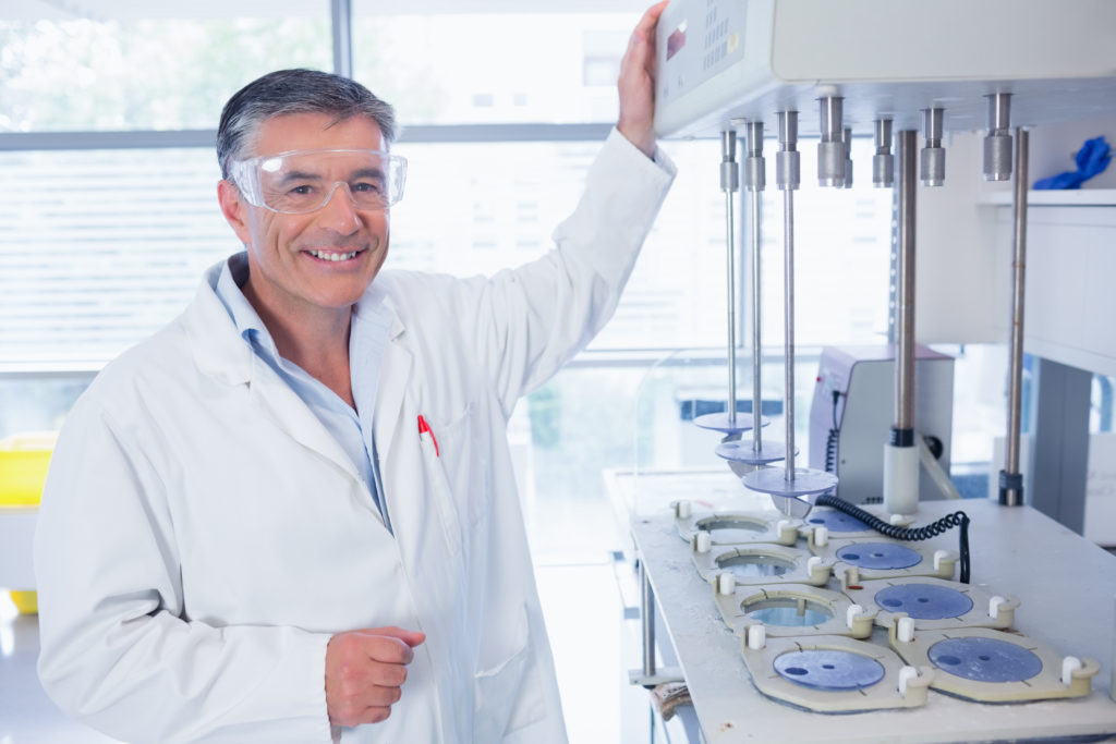 Scientist Smiling Wearing Safety Goggles