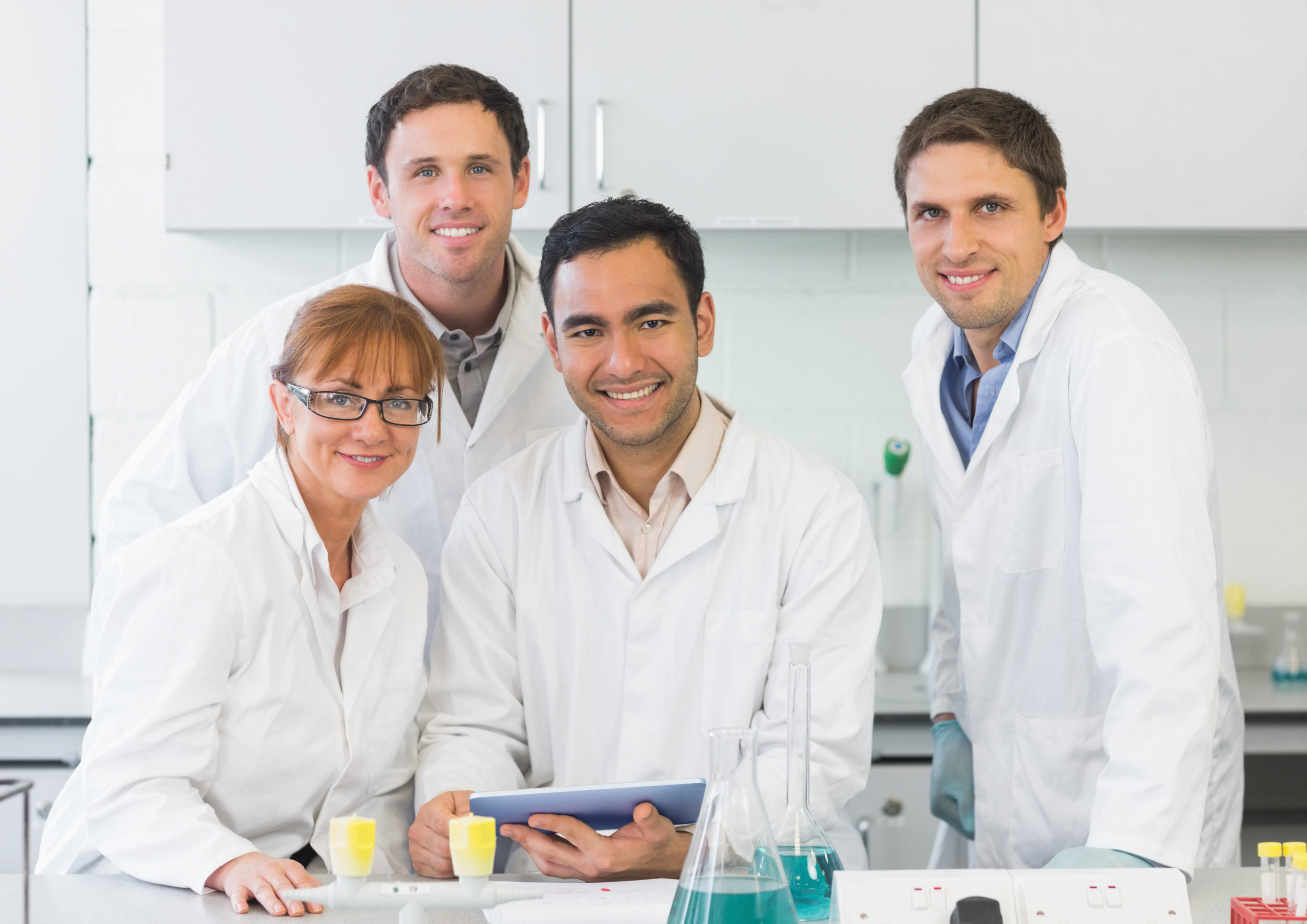 Smiling Doctors Working in a Lab