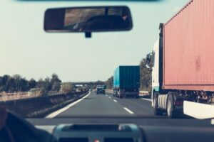 transportation trucks driving on highway